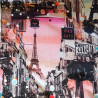 Primer plano de la tela estampada con la Torre Eiffel, calles parisinas y colores vivos.